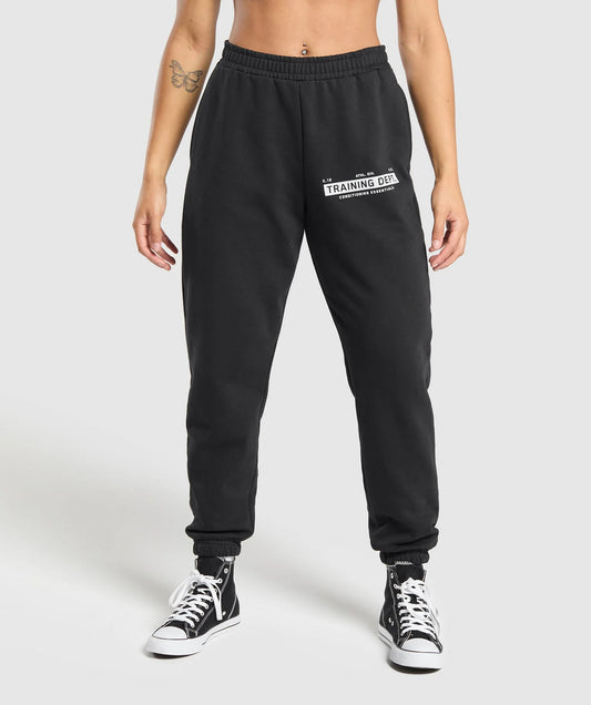 TRAINING DEPARTMENT GRAPHIC OVERSIZED JOGGERS